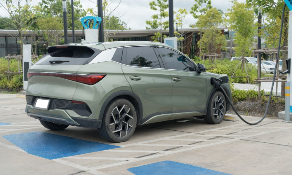 Electric car charging at a public charging station